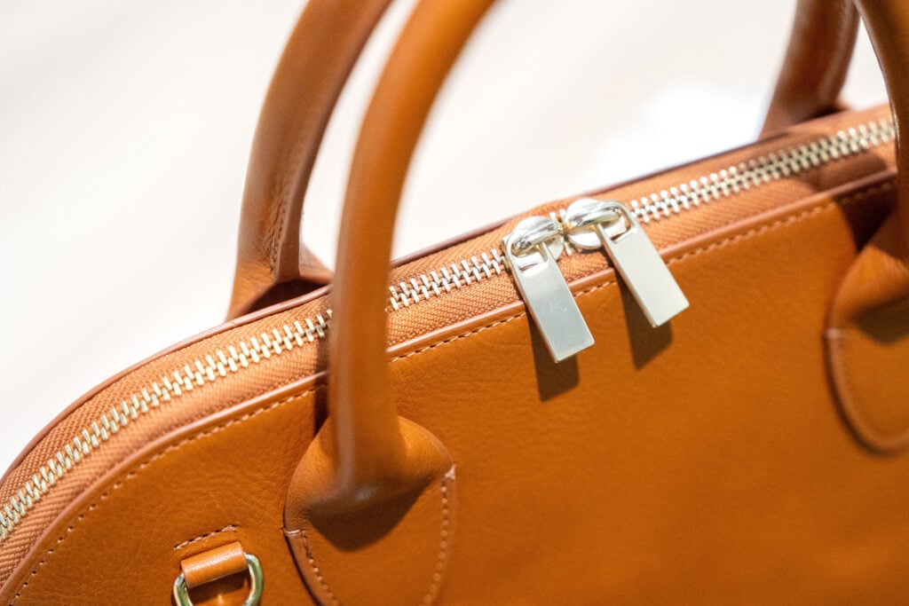 YKK Develops LUXFLAT™ Zipper for Handbags