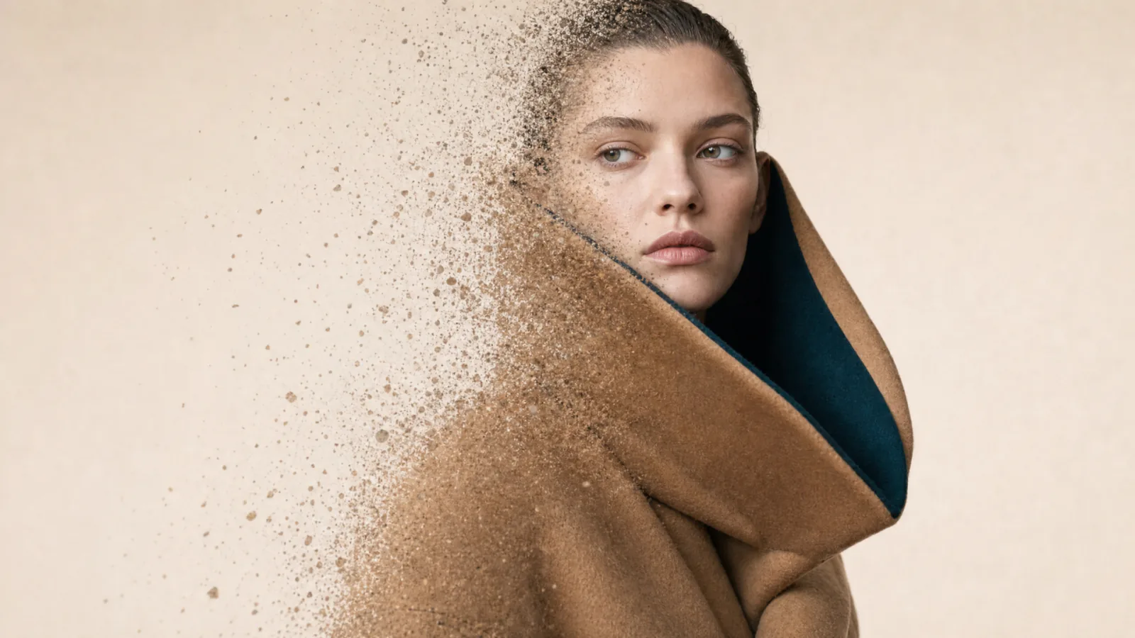 Illustration of a model in a camel coat with part of her portrait dissolving into particles.